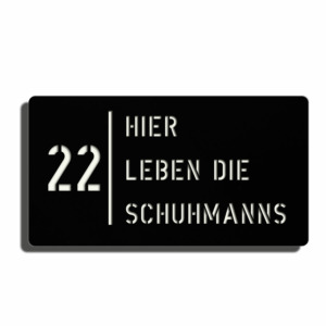 Dies ist ein Bild von einem - Hier leben die Schild - mit schwarz glänzender Oberfläche und weißer Schriftfarbe