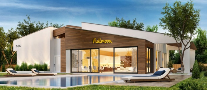 Dies ist ein Bild eines großen Metall Schriftzug FULLMOON in Aluminium Gelb in 1,60 Meter Länge am Giebel eines Poolhauses